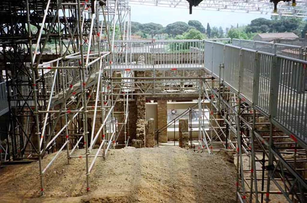 IX.12.2 and IX.12.1 Pompeii. May 2010. Looking south from top of unexcavated pumice..