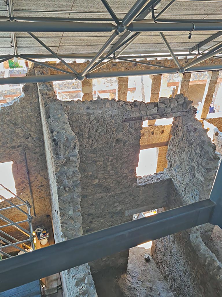 IX.12.5 Pompeii. June 2024. 
Looking south from above rear room into shop-area. Photo courtesy of Giuseppe Ciaramella.
