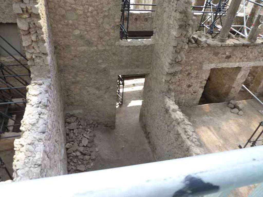 IX.12.5 Pompeii. May 2010. Rear room. Looking south into shop area.