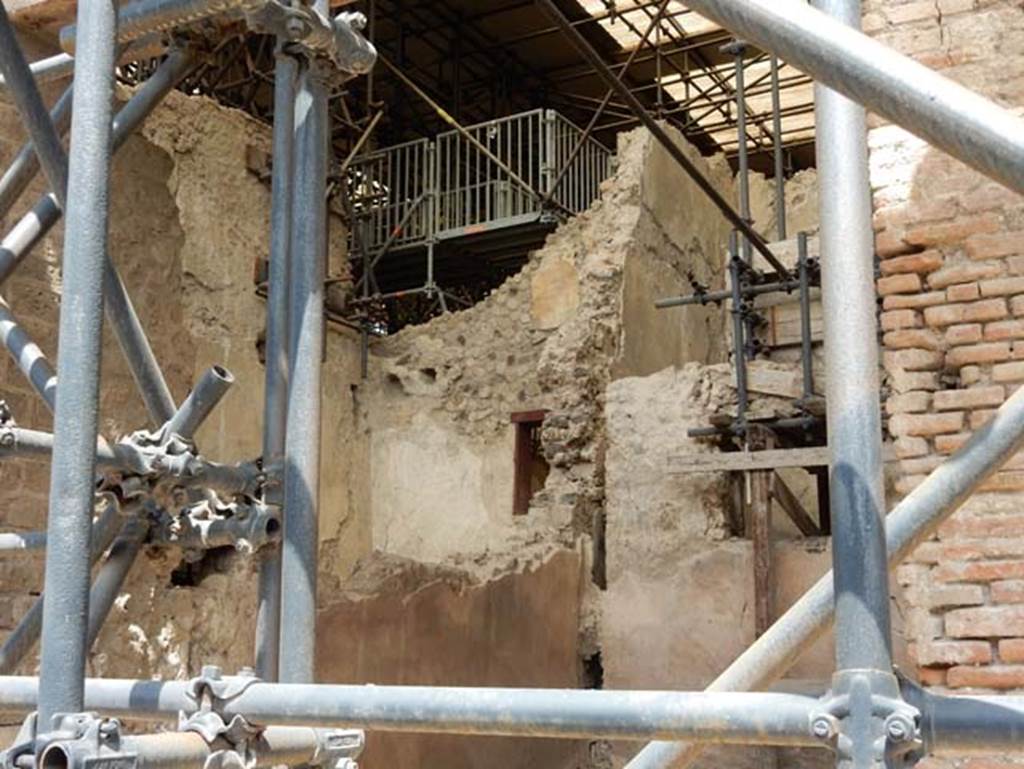 IX.12.7 Pompeii, May 2018. Looking towards west wall of shop from entrance doorway. At the rear of the west wall are the upper walls of room 9 of IX.12.6. Photo courtesy of Buzz Ferebee.

 
