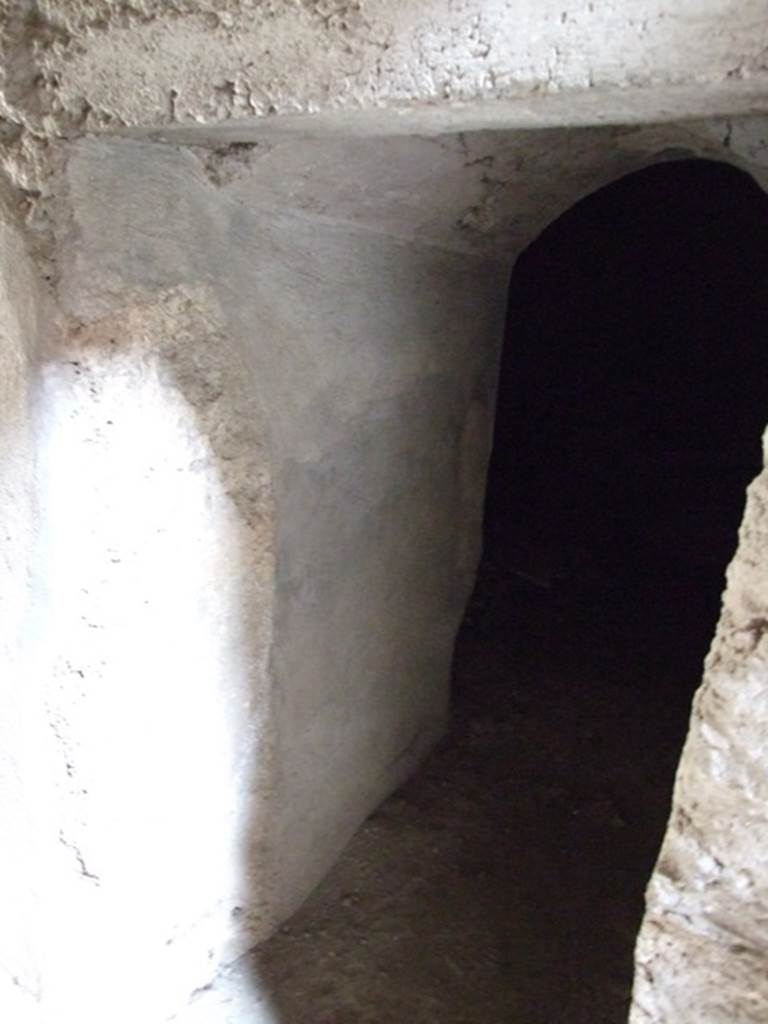 IX.13.1-3 Pompeii.  March 2009.  Doorway to room 6, under stairs.