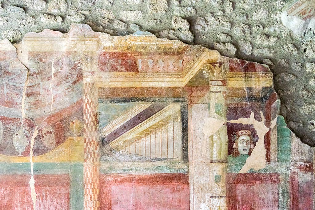 IX.14.4 Pompeii. July 2024. Room 3, detail from upper centre of east wall. Photo courtesy of Johannes Eber.