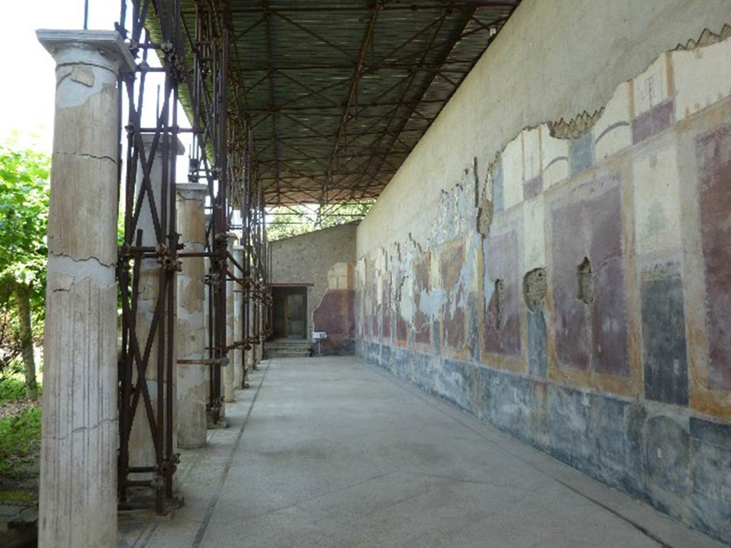 Castellammare di Stabia, Villa San Marco, July 2010. Room 3, looking south along west portico towards steps and doorway to room 8. Photo courtesy of Michael Binns.
