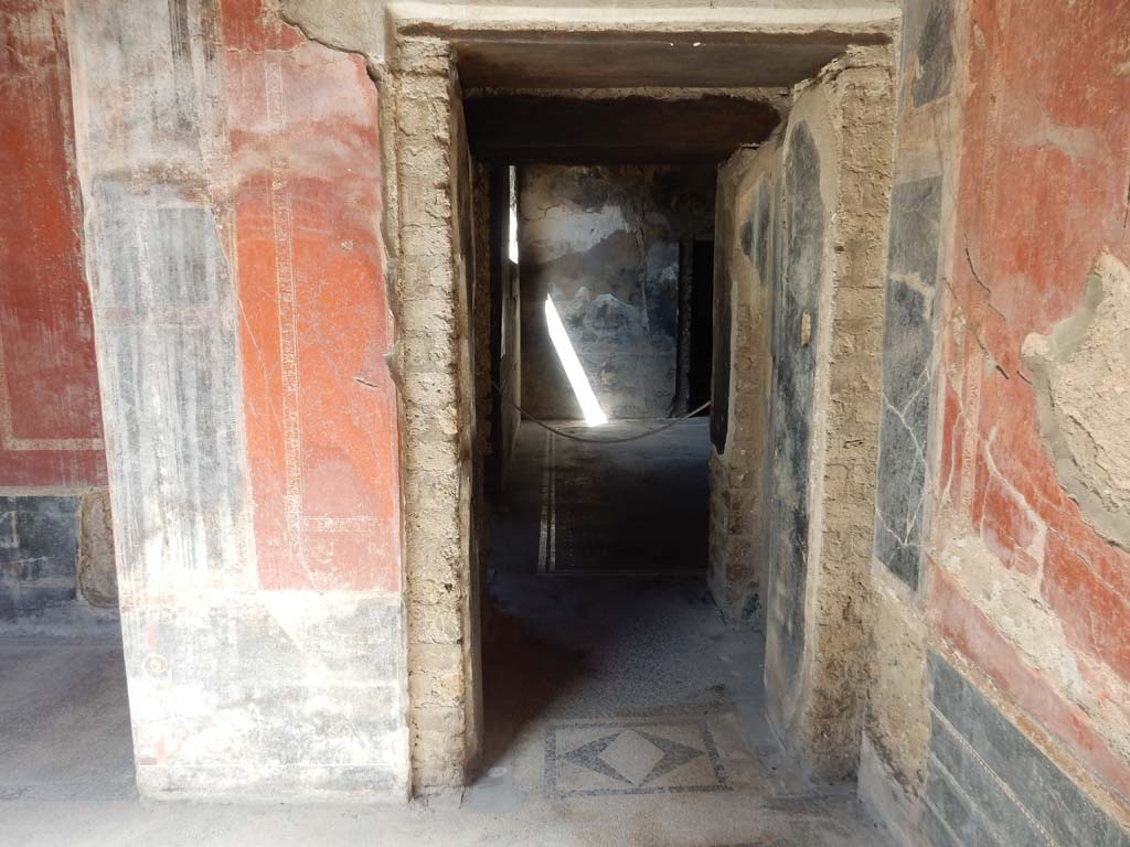 Villa San Marco, Stabiae, June 2019. Room 25, doorway in west wall in north-west corner, into vestibule leading to room 23. 
Photo courtesy of Buzz Ferebee

