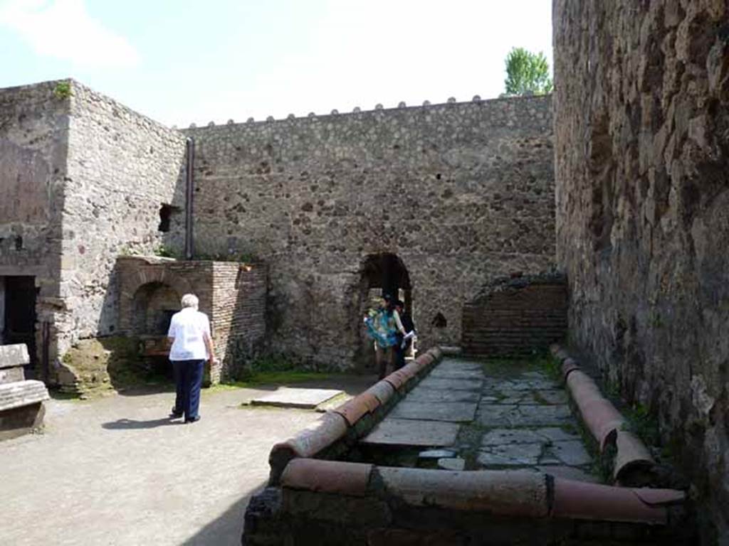 Villa of Mysteries, Pompeii. May 2010. Room 61, looking south, along length of hearth and oven.