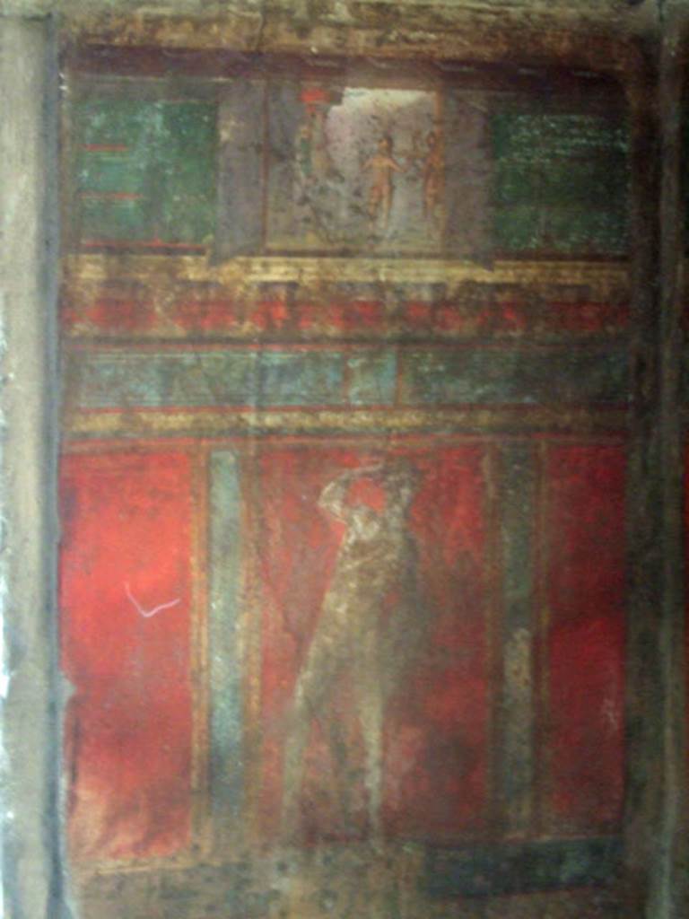 Pompeii. Villa of Mysteries. May 2006. Room 4, wall painting on west wall in north-west corner. The small upper panel shows a painting of a sacrifice.
