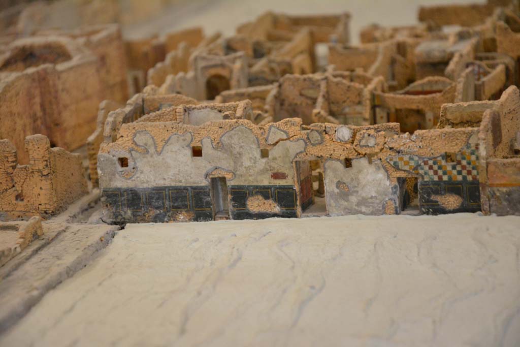 Unnamed vicolo, between IX.5 and IX.6 Pompeii. July 2017. Vicolo di Tesmo, on left, doorways into IX.5.19, 18 and 17.  
From cork model in Naples Archaeological Museum.
Foto Annette Haug, ERC Grant 681269 DÉCOR.
