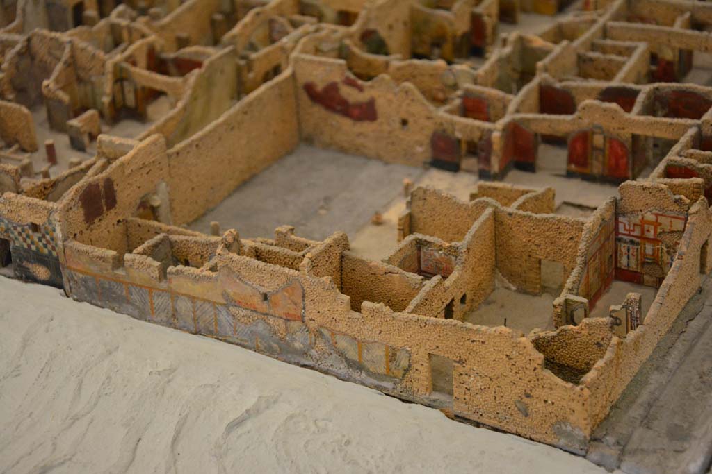 Unnamed vicolo, between IX.5 and IX.6 Pompeii. July 2017. Vicolo del Centenario, on right. Doorways into IX.5.17, on left, and IX.5.16, on right.  
From cork model in Naples Archaeological Museum.
Foto Annette Haug, ERC Grant 681269 DÉCOR.
