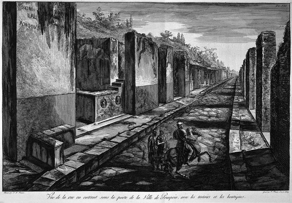 Via Consolare, Pompeii. Pre-1778 drawing by G. B. Piranesi, published by F Piranesi in 1804. 
Looking south, with the bar-counter with decorative heads at VI.1.2. visible on the left.
Foto Taylor Lauritsen, ERC Grant 681269 DÉCOR.
See Piranesi, F, 1804. Antiquités de la Grande Grèce: Tome I. Paris: Piranesi and Le Blanc, Pl. VIII.

