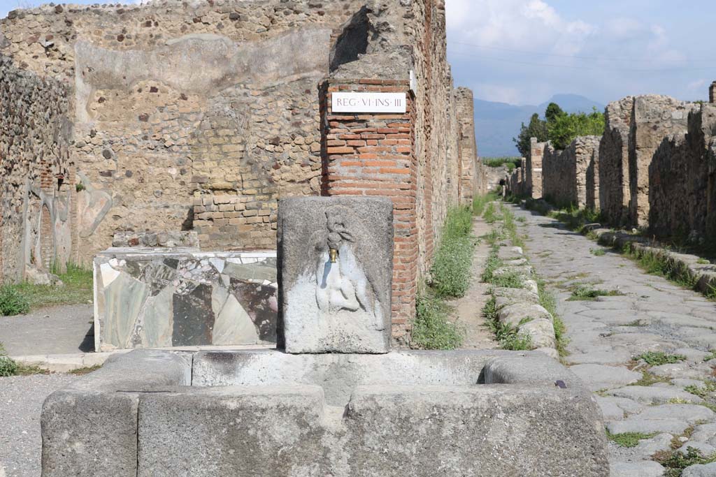 Vicolo di Modesto. December 2018. Looking north from fountain at junction with Via Consolare. Photo courtesy of Aude Durand.