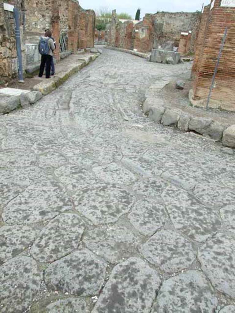 Via Consolare. May 2010. Wheel ruts in the road surface, looking north from Via delle Terme.