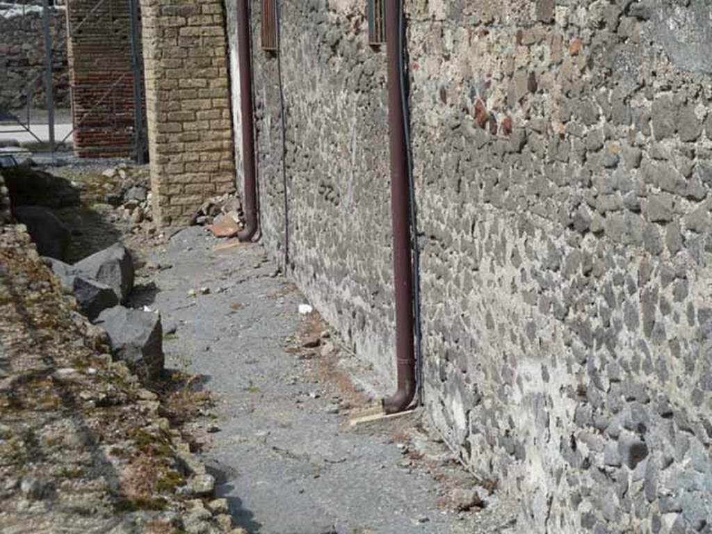 Alleyway on south side of Via Marina, between the Basilica and Temple of Venus. May 2010. Looking north.