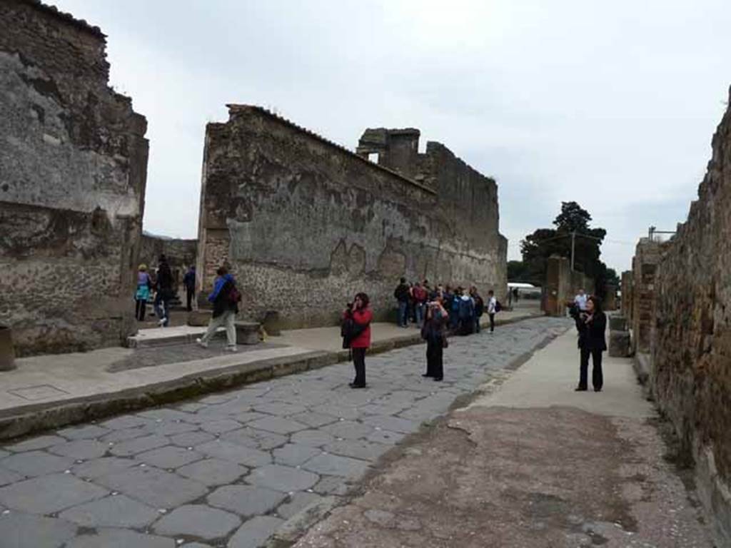 Via Marina, south side, May 2010. Looking south-west at VIII.1.1 north wall of the Basilica.