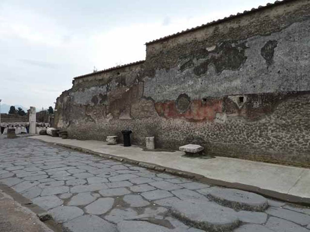 Via Marina, south side, May 2010. Looking south-east at VIII.1.1 north wall of the Basilica towards the Forum.