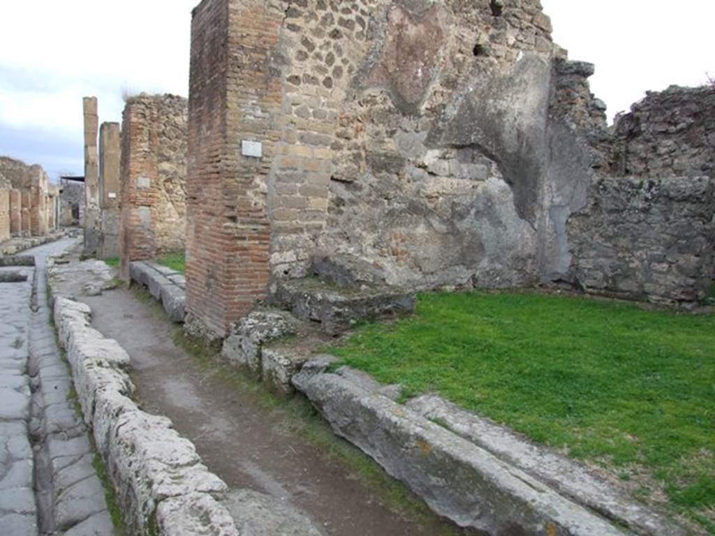 Via degli Augustali, south side, December 2007. Looking east from VII.12.4. 