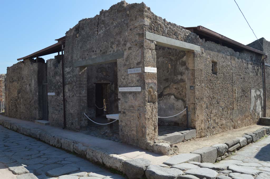 Via degli Augustali, Pompeii. October 2017. Looking south-east towards VII.1.41/42 at junction with Vicolo del Lupanare, on right.
Foto Taylor Lauritsen, ERC Grant 681269 DÉCOR.
