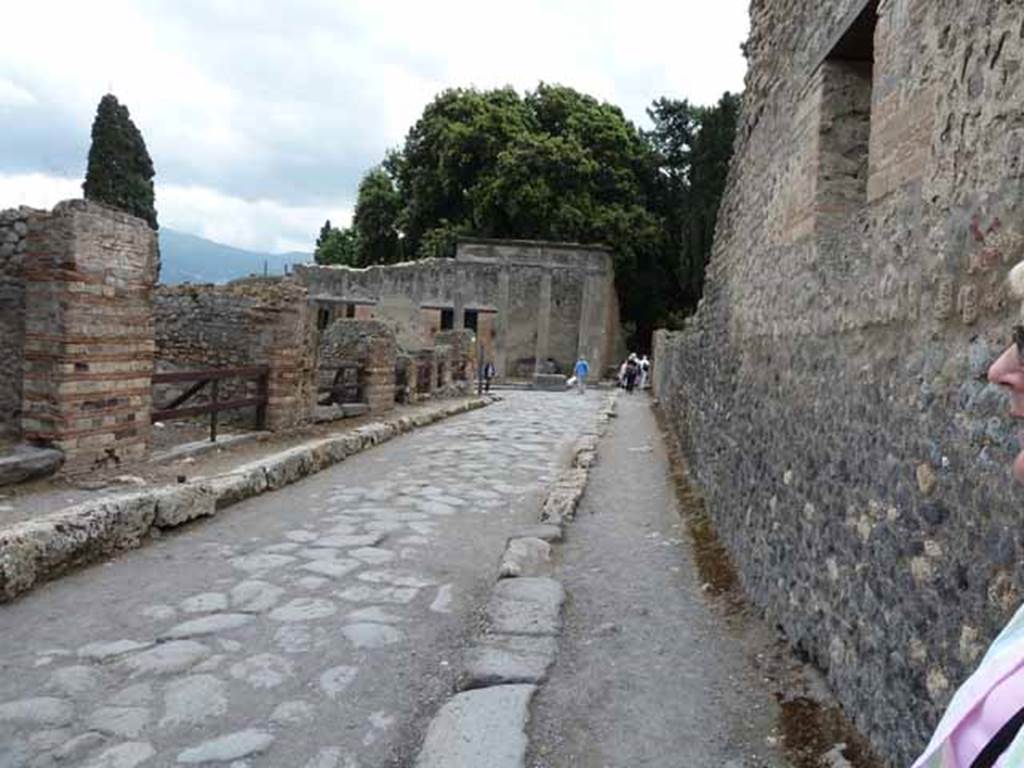 Via dei Teatri, May 2010. Looking south between VIII.4 and VIII.5.