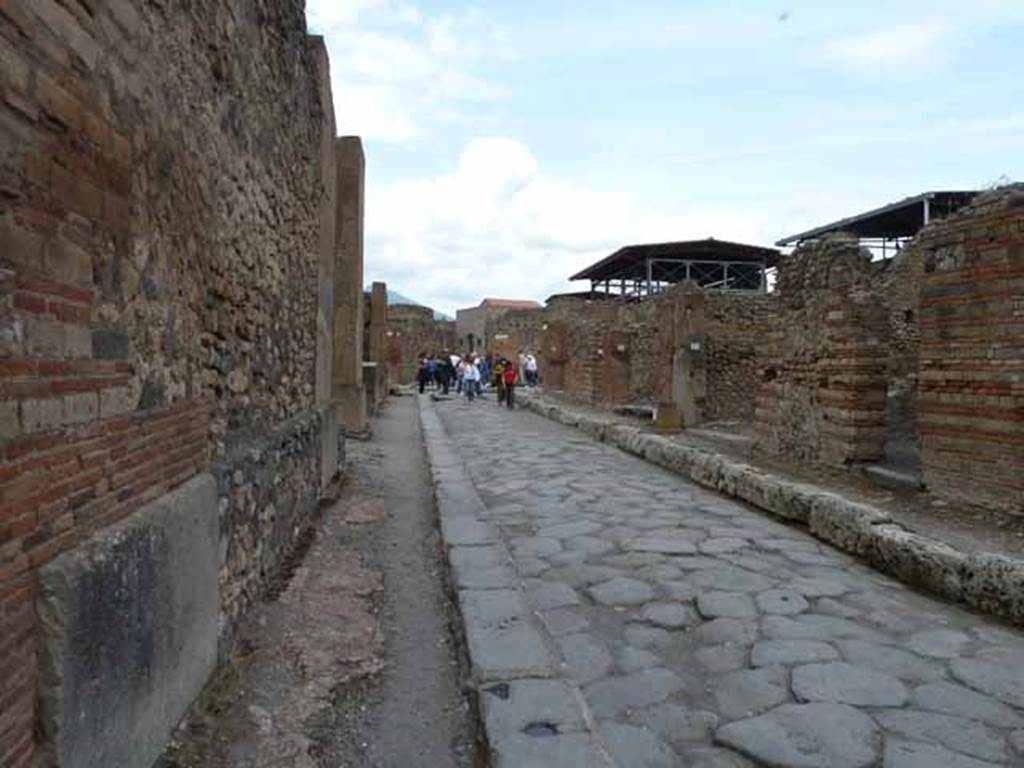 Via dei Teatri, east side, May 2010. Looking north between VIII.5 and VIII.4.