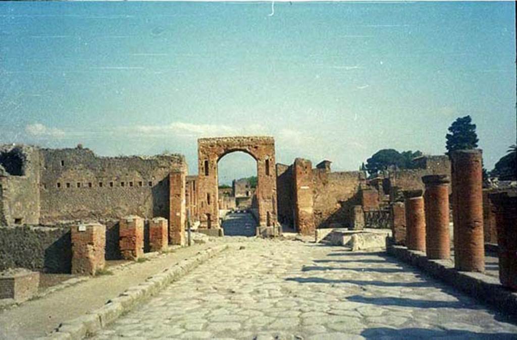 Via del Foro. July 2011. Looking north to junction with Via Mercurio. 
Photo courtesy of Rick Bauer.
