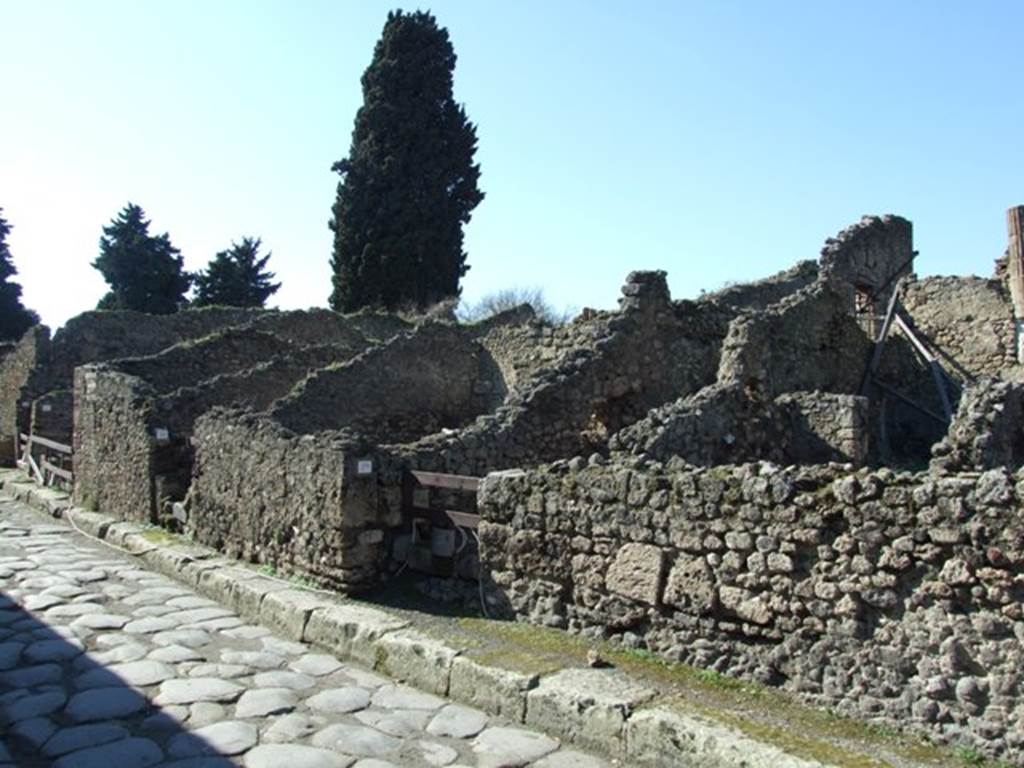 Via del Tempio d’Iside. North side. Looking west from VIII.4.29. March 2009.