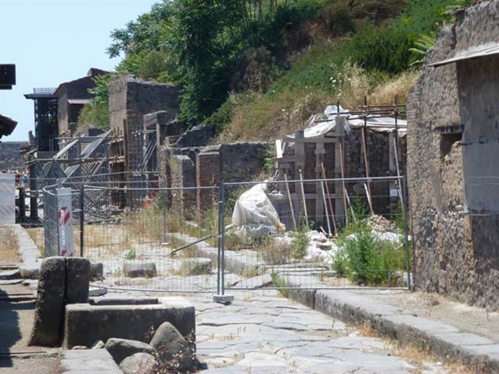 Via dell’Abbondanza, north side. May 2010. Looking west from near III.4.2 along III.4 and III.3. Photo courtesy of Michael Binns.
