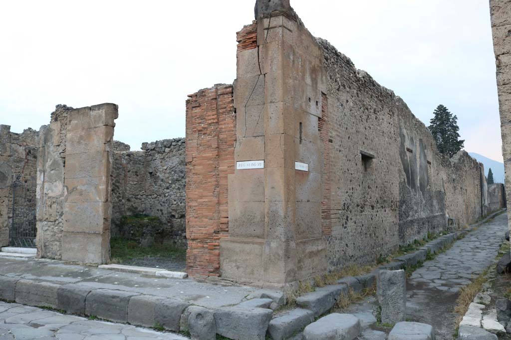 Via della Fortuna, north side. December 2018. 
Looking north towards junction with Vicolo del Labirinto, at side of VI.12.6, on left. Photo courtesy of Aude Durand.
