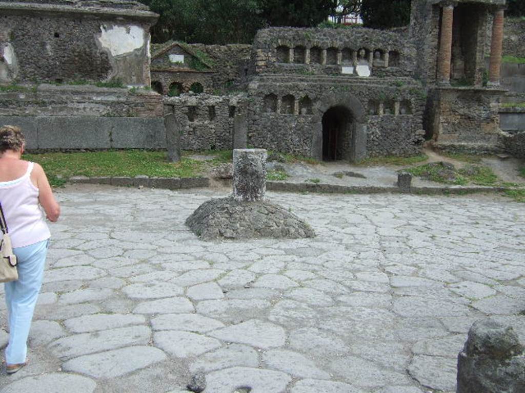 Via delle Tombe and the cippus of Titus Suedius Clemens, May 2006. 
Looking south from the crossroads with Via di Nocera. 
