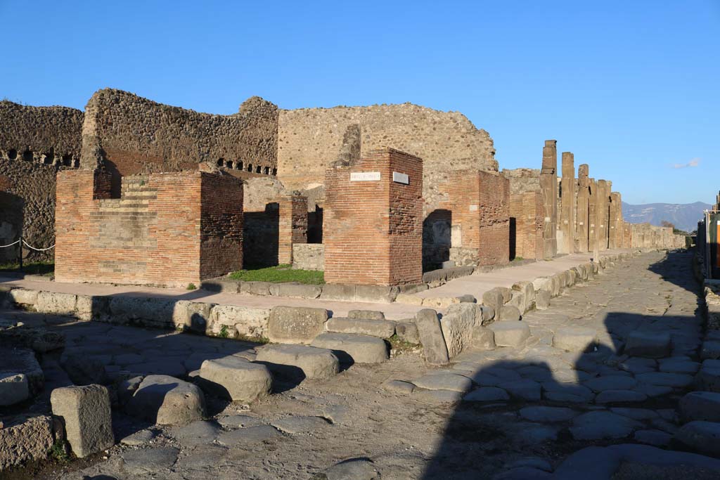 Via di Nola, north side, December 2018. 
Looking east from junction with Via del Vesuvio, on left, along south side of insula V.1. Photo courtesy of Aude Durand.
