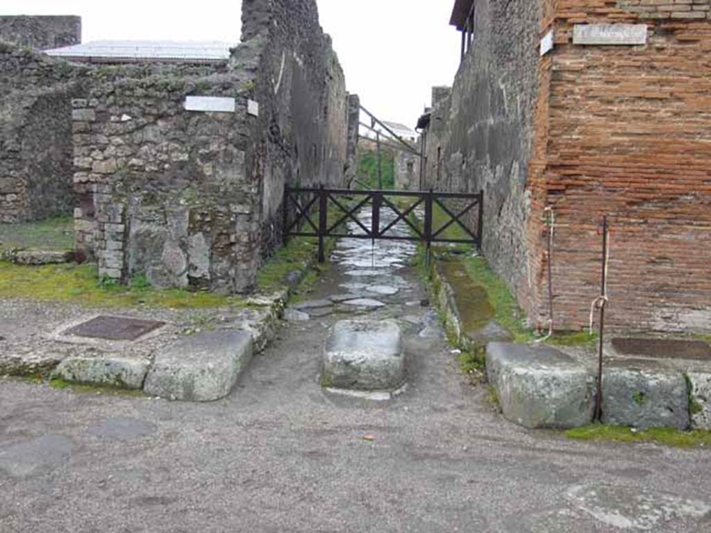 Via di Nola, south side, May 2010. Looking south to Vicolo del Centenario between IX.8 and IX.5.