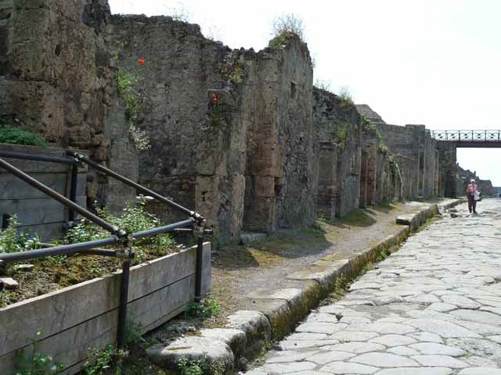 Via di Nola, south side, May 2010.  Looking west along III.8 from near unexcavated vicolo.