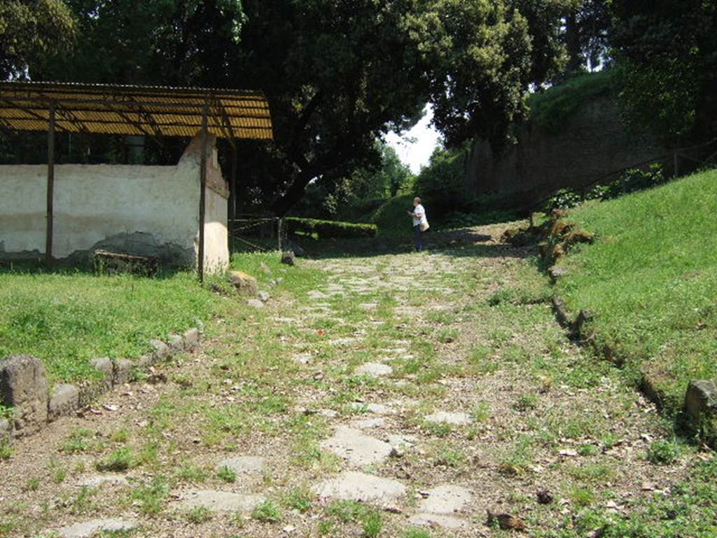 Ancient road outside city walls. May 2006.Looking south past Tomb of M. Obellius Firmus to junction with Via di Nola. 
