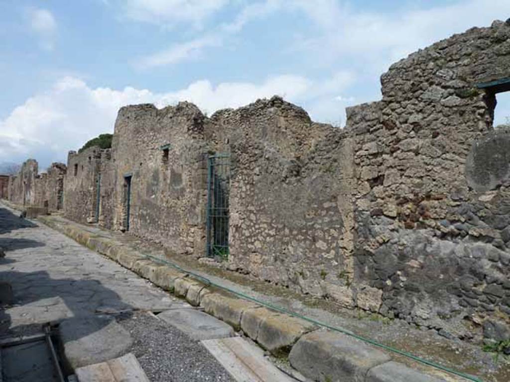 Vicolo dei Vettii, east side. May 2010. Looking north along VI.16, from VI.16.27 to VI.16.31.