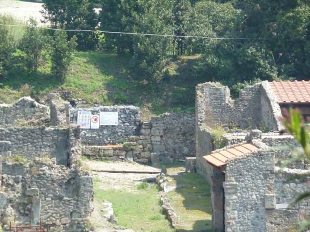 Vicolo del Conciapelle between I.2 and I.1 Looking east from the Triangular Forum, towards the junction with Vicolo del Citarista, and into the unexcavated.