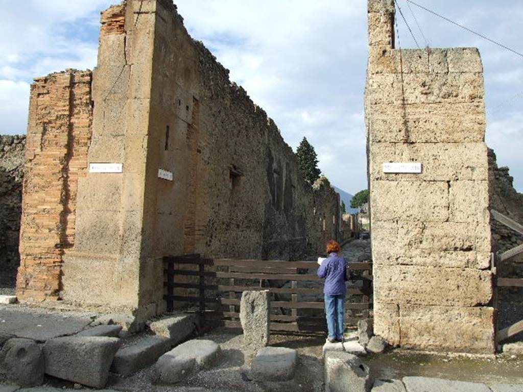 Via della Fortuna. December 2006. North side. Looking north to Vicolo del Labirinto between VI.12 and VI.13.