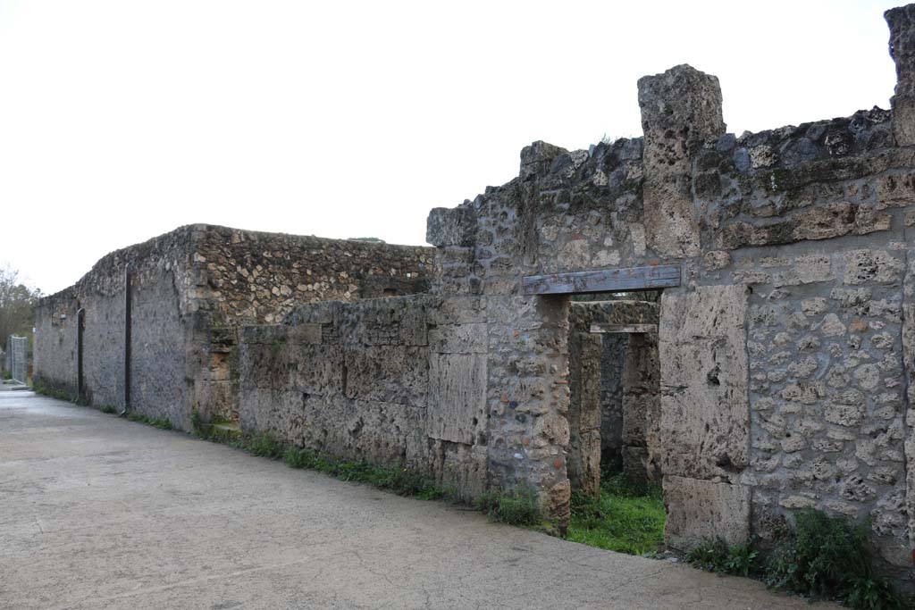 Vicolo della Nave Europa, west side, Pompeii. December 2018. 
 Looking south-west towards entrance doorway of I.16.7 in Vicolo della Nave Europa. Photo courtesy of Aude Durand.
