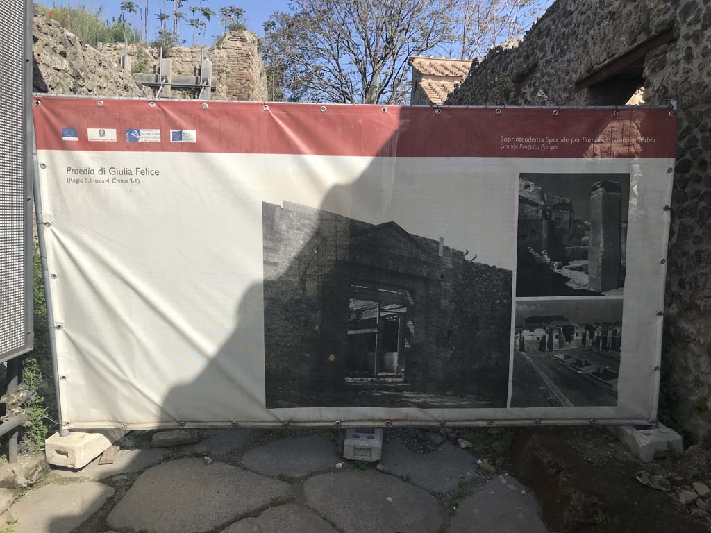 Vicolo di Ifigenia. April 2019. Looking north from Via dell’Abbondanza.
(NB: the photos of the Praedia of Giulia Felice are just here as a screen – the actual site is a couple of hundred metres further along the Via dell’Abbondanza). Photo courtesy of Rick Bauer.
