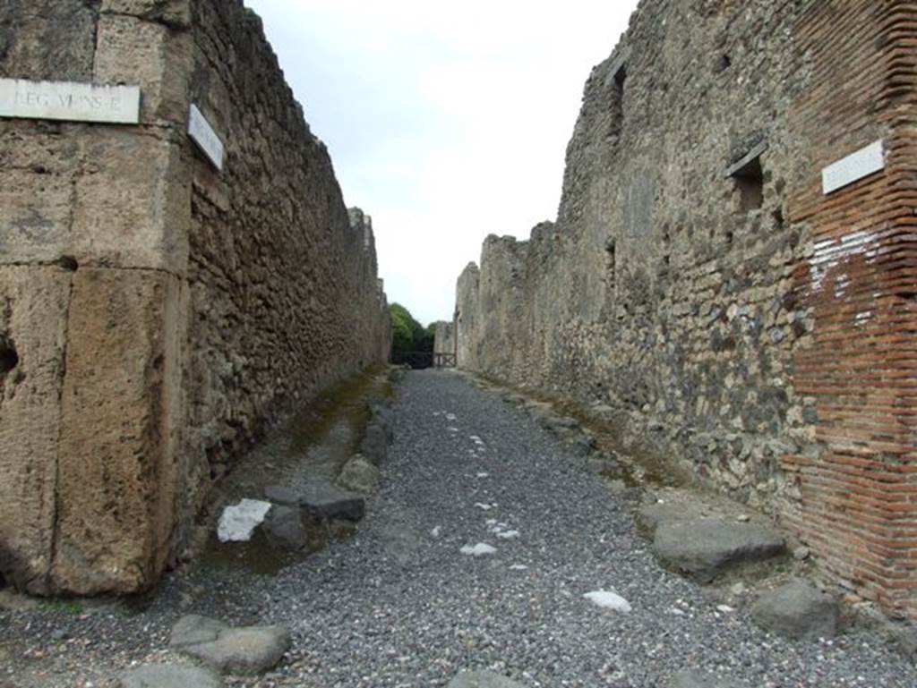 Vicolo di Lucrezio Frontone between V.3 and V.4. Looking north. March 2009.