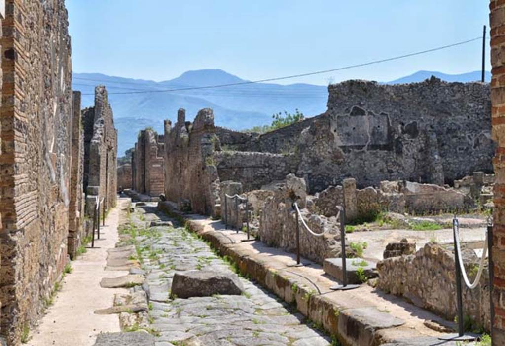 Vicolo di Tesmo between IX.6 and IX.3. April 2018. Looking south from junction with unnamed vicolo. Note the excavation which has taken place, on the right. This would be IX.3.21 and 22.
Photo courtesy of Ian Lycett-King. Use is subject to Creative Commons Attribution-NonCommercial License v.4 International.

