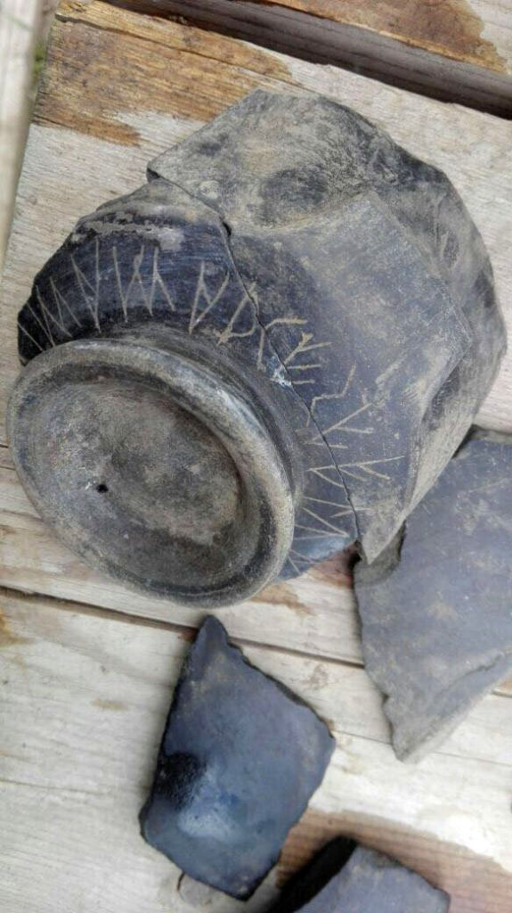  Santuario extraurbano del Fondo Iozzino.  2014. Pottery with scratched Etruscan inscription.
Photograph © Parco Archeologico di Pompei. 
In the suburb of Pompeii, in the heart of the modern city, archaeological investigations have resumed in the Sanctuary of the Fondo Iozzino. The area, once a quarry for extraction of lapilli owned by Iozzino, investigated several times since 1960, has seen since 2014 the start of a thorough and continuous research that has led to the discovery of a rich mass of votive offerings, with epigraphic testimonies in the Etruscan language that have cast new light on the archaic Pompeii, returning what is currently the richest repertoire of Etruscan inscriptions in Campania.

Nel suburbio di Pompei, nel pieno centro della città moderna, sono riprese le indagini archeologiche nel Santuario del Fondo Iozzino. L’area, un tempo cava di estrazione del lapillo di proprietà Iozzino, indagata a più riprese a partire dal 1960, ha visto dal 2014 l’avvio di una ricerca approfondita e continuativa che ha portato alla scoperta di una ricca messe di offerte votive, con testimonianze epigrafiche in lingua etrusca che hanno gettato nuova luce sulla Pompei arcaica, restituendo quello che al momento è il più ricco repertorio di iscrizioni etrusche della Campania.
Vedi http://pompeiisites.org/press-kit/nuovi-scavi-e-ricerche-nel-parco-archeologico-di-pompei/
