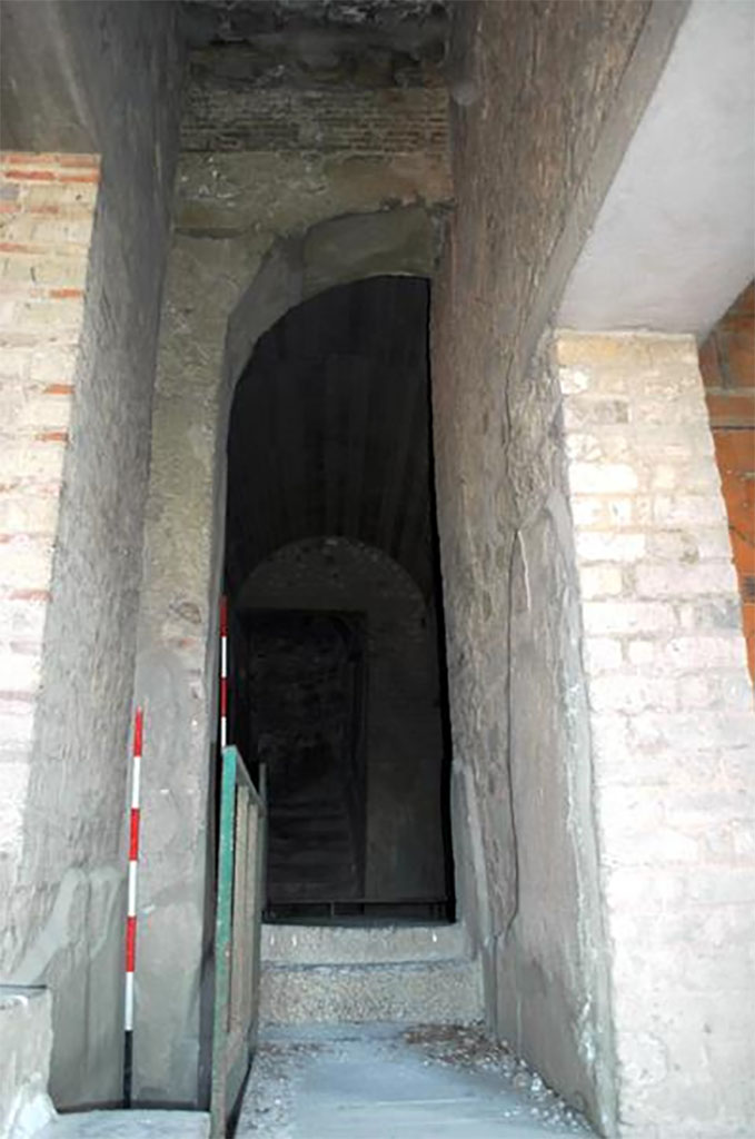 VII.16.17-22 Pompeii. 2014. Corridor 43 with steps ahead with doorway to yellow room right and black room left.
This is the location of the Porta Occidentalis or Western Gate, originally with houses at each side but the house was built over it in Roman times.
Researchers at The University of Suor Orsola Benincasa discovered the presence of the Porta Occidentalis (posterula) with access to the city, aligned on an axis with via di Nola and Porta di Nola inside a contemporarily chronological arch ascribable to between III and II century BC. 

VII.16.17-22 Pompei. 2014. Corridoio 43 con gradini avanti con porta alla camera gialla a destra e stanza nera a sinistra.
Questa è la posizione della Porta Occidentalis o Porta Occidentale, originariamente con case su ogni lato, ma la casa è stata costruita su di esso in epoca romana.
I ricercatori dell'Università di Suor Orsola Benincasa hanno scoperto la presenza della Porta Occidentalis (posterula) con accesso alla città, allineata su un asse con via di Nola e Porta di Nola all’interno di un arco cronologico coevo ascrivibile tra III e II secolo a.C.

Photograph © Parco Archeologico di Pompei.

https://www.identitainsorgenti.com/verso-il-4-maggio-due-nuove-scoperte-nel-sito-la-porta-occidentalis-e-il-santuario-fuori-le-mura/
