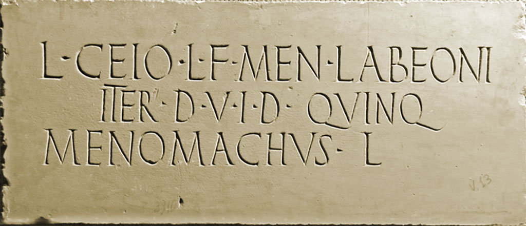 HGE39 Pompeii. According to Kockel, on the 20th April 1813 a marble plaque with remains of stucco on the edges was found at the side of the tomb. 
He attributes it to HGE39. It had the inscription 

L CEIO L F MEN LABEONI
ITER D V I D QVINQ
MENOMACHVS L

According to Epigraphik-Datenbank Clauss/Slaby (See www.manfredclauss.de) this read

L(ucio) Ceio L(uci) f(ilio) Men(enia) Labeoni 
iter(um) d(uum)v(iro) i(ure) d(icundo) quinq(uennali)
Menomachus l(ibertus)       [CIL X 1037]

