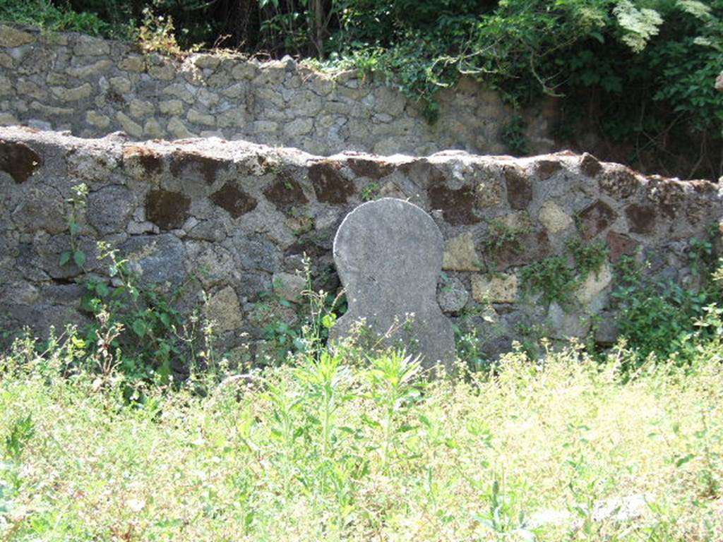 HGW21 Pompeii. May 2006. Looking south at large cippus of N. Istacidius Helenus standing against rear wall. The smaller cippus is to the left of the large cippus.