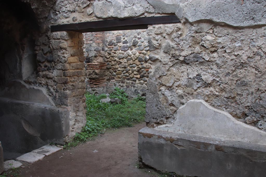 HGW24 Pompeii. Villa of Diomedes. October 2023. 
Doorway into the “wagon’s entrance”, in the north wall of this room. Photo courtesy of Klaus Heese.
