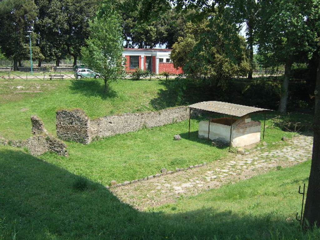 NGOF Pompeii. May 2006. 
Tomb of M. Obellius Firmus and ancient roadway running past the front, looking  north-east.
