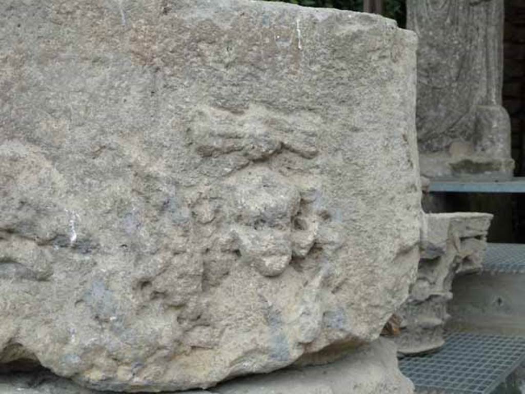 Pompeii Porta Nocera. May 2010. Display area for items found in and near the tombs. Detail of carved skull? 