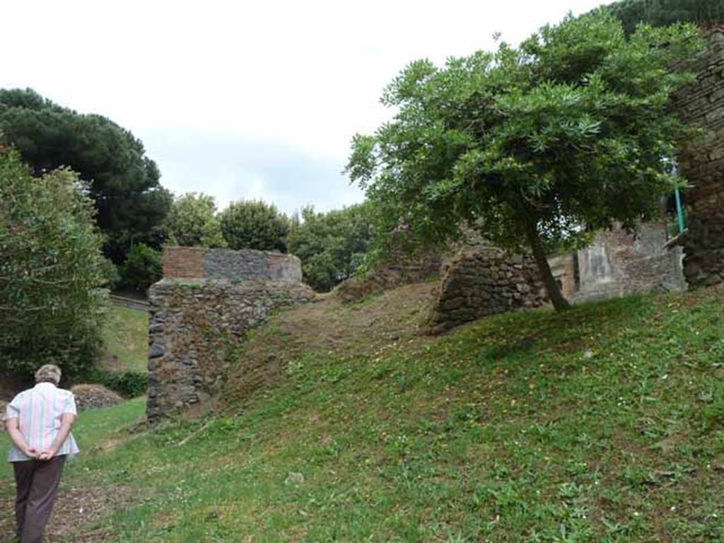 Pompeii Porta Nocera. Tomb 32EN, looking east towards the west sides of 32EN and 30EN from the rear. May 2010.