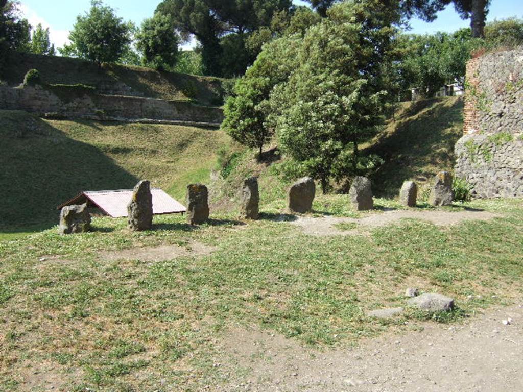 Pompeii Porta Nocera. Tomb 34EN, tomb of Afrea Prima?  May 2006.
The tomb has eight cippi. The seventh one from the west has a triangular top and an inscription
AFREIA
M(arci)  L(iberta) 
PRIMA.
This does not necessarily name the tomb.
See DAmbrosio, A. and De Caro, S., 1983. Un Impegno per Pompei: Fotopiano e documentazione della Necropoli di Porta Nocera. Milano: Touring Club Italiano. (34EN).
