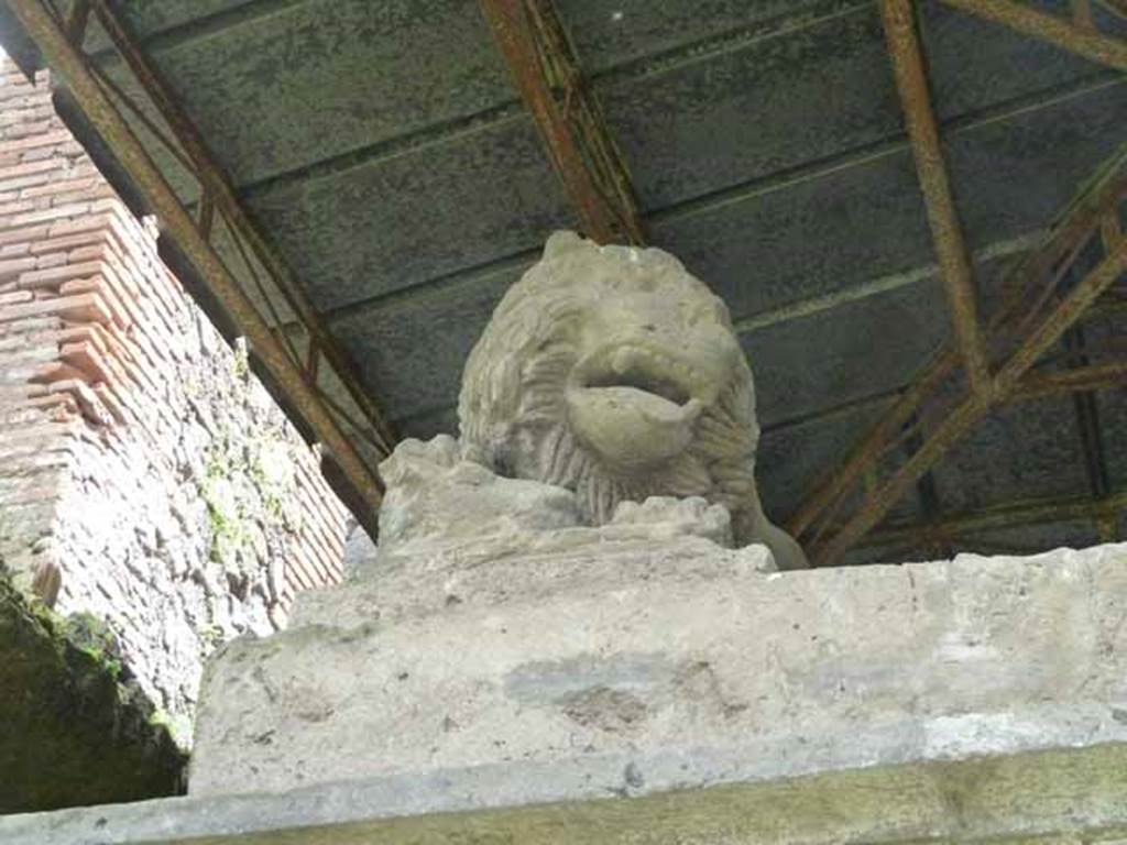 Pompeii Porta Nocera Tomb 31OS. May 2010. Lion statue on east side.