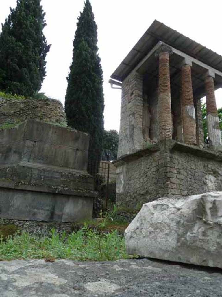 Pompeii Porta Nocera Tombs 11OS, west side on the left, and looking towards 13OS, on the right. May 2010.