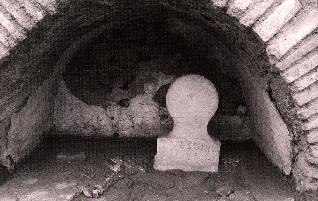 Pompeii Porta Nocera. Tomb 23OS. Columella of P Vesonius Pileros. The space beside him, meant for Orfellius, has been back-filled and paved over. 
According to Lepetz and Van Andringa, Roman legal texts confirm that a tomb was not considered a sacred site until a body was buried in it, and only the spot where a body was interred was protected by law against profanation. 
Since Faustus was still alive, Phileros was able to bar his former friend once and for all from the burial place he had originally provided for him in anticipation of death. 
And this is what he did, destroying the slab that sealed the cavity for two adjoining and still empty graves. 
He then erased his former friend's stele before backfilling the cinerary urn designated for Faustus and the ceramic pipe into which libations would have been poured on his remains. 
Finally, the now obsolete grave was covered with a new sealing surface into which pieces of black stone marked Phileros's name and defined the parameters of a now extended grave available solely for Phileros.
See Lepetz S. and Van Andringa W., 2011. Publius Vesonius Phileros vivos monumentum fecit-.Investigations in a sector of the Porta Nocera cemetery in Roman Pompeii. p. 119, Fig. 6.6.